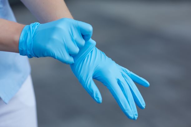 AdobeStock_photoniko _Handschuhe_corona web